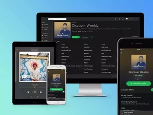Spotify prepares to go public with licensing deal with Warner Music