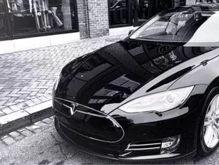 Tesla plans to debut a cheaper &#039;Model E&#039; in 2015