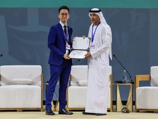Ted Chen, Co-founder and CEO of Evercomm receiving the TechSprint award for its platform at COP28