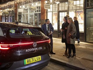 Drive and passengers entering an Addison Lee Volkswagen ID.4 EV