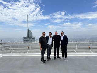 Kiarash Jahangiri (left) with Edge Centres CEO Jon Eaves (second right). Jahangiri is now Edge's CTO. Credit: Edge Centres