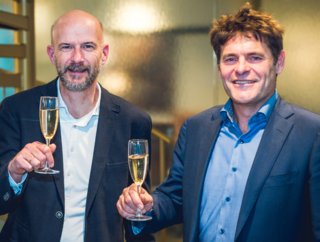 Mail to Pay's Kees Neven (left) celebrates with POM CEO Johannes Vermeire.
