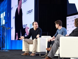 Former OpenAI executives Greg Brockman (left) and Sam Altman (middle) speaking onstage during TechCrunch Disrupt San Francisco 2019 (Steve Jennings/Getty Images for TechCrunch / CC BY 2.0 DEED)