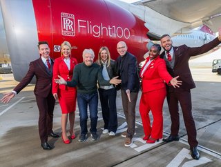 Virgin Atlantic Founder Sir Richard Branson with Virgin Atlantic staff on Flight 100