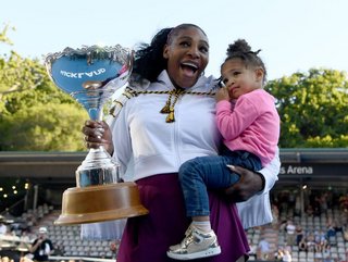 Serena Williams with daughter Olympia  Credit: Getty Images/Hannah Peters / Staff