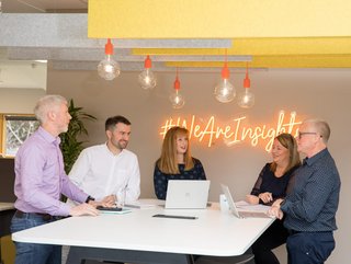 CEO Fiona Logan with her leadership team at Insights' global headquarters